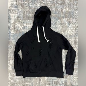 Katie J black hooded sweatshirt with fashion holes. Size youth XL.